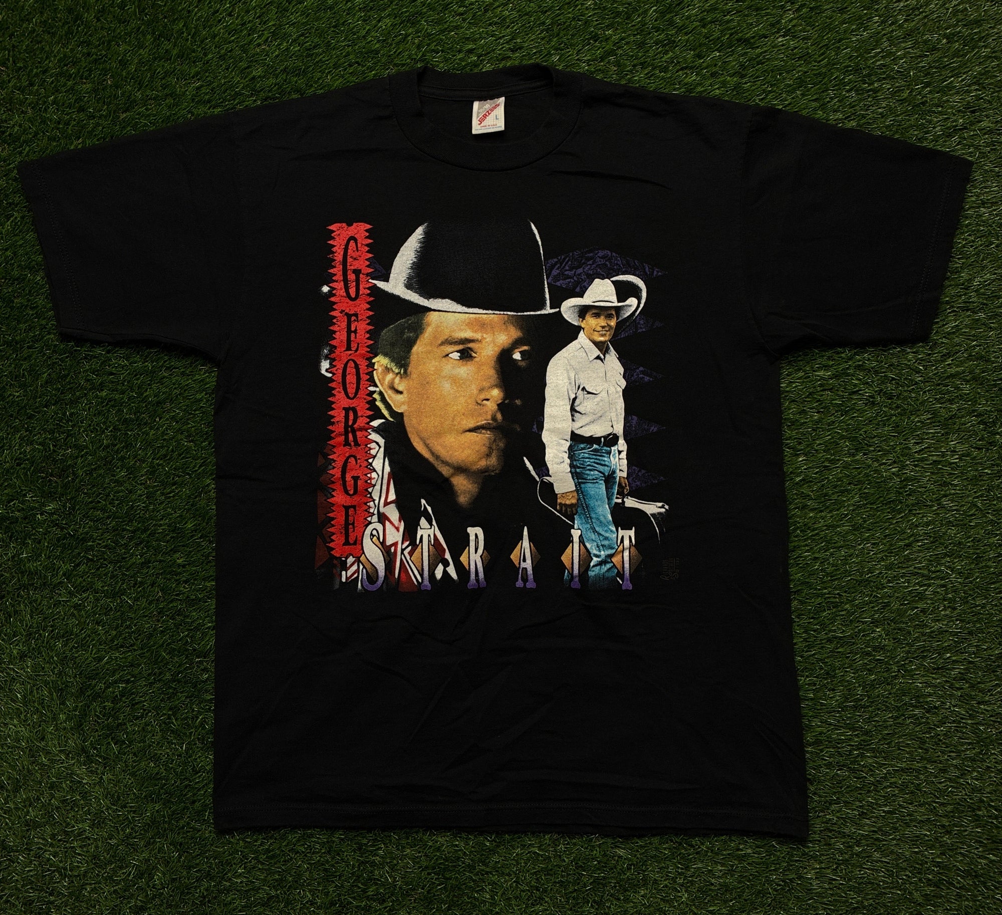 George Strait (L)